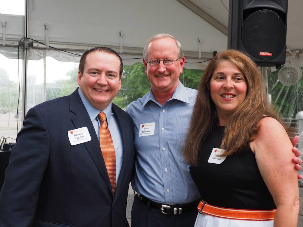 Pace and Karen Robinson with Coach. (Photo by Gary Heatherly)