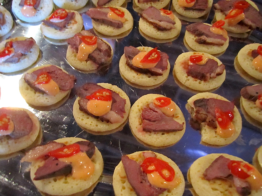 Tiny little hoe cakes with beef tenderloin.