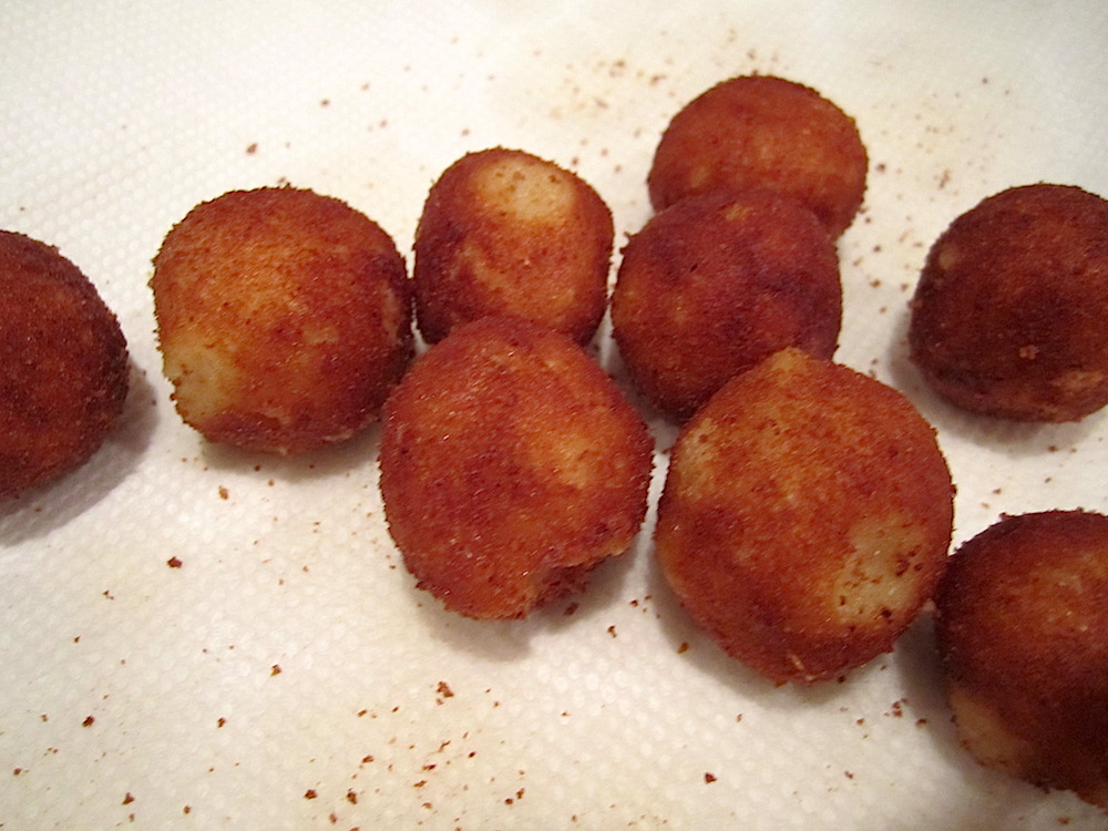 As soon as everyone arrived and was seated at the kitchen island, Chef Parolari passed a plate of "buldar" -- cheese balls.