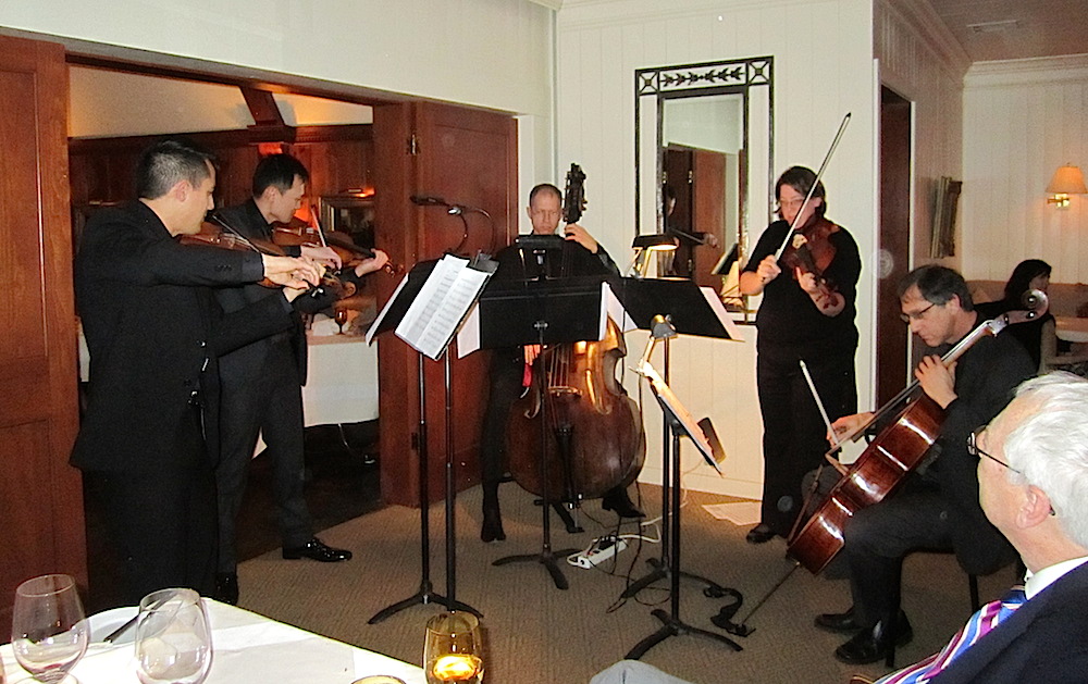 Alan, bottom right corner enjoys the music. From left, Concertmaster Gabe Lefkowitz, Associate Concertmaster Gordon Tsai, Steve Benne, Kathryn Gawne and Andy Bryenton.