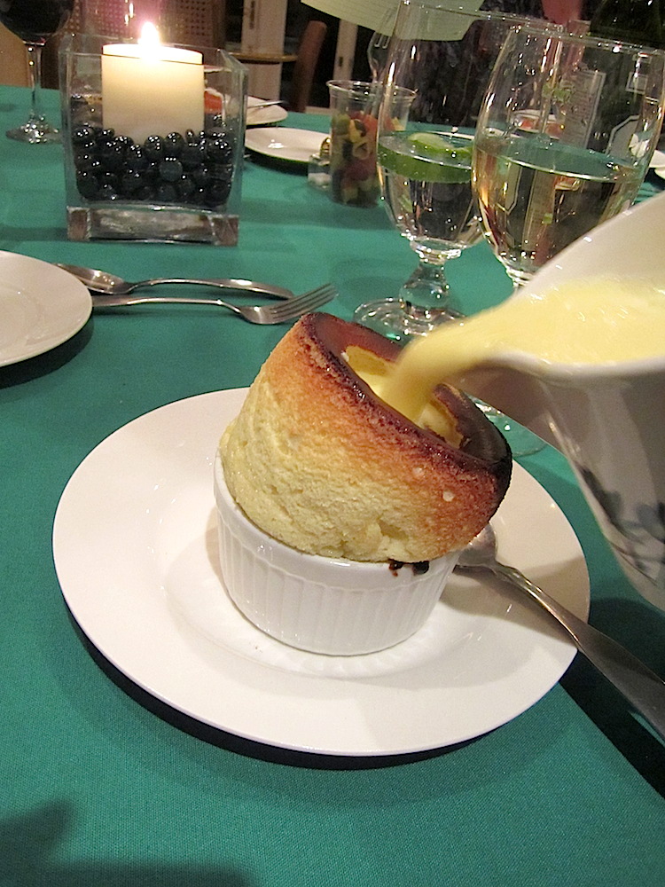 Here's a lemony sauce being poured into a hot souffle. Alan was in heaven.