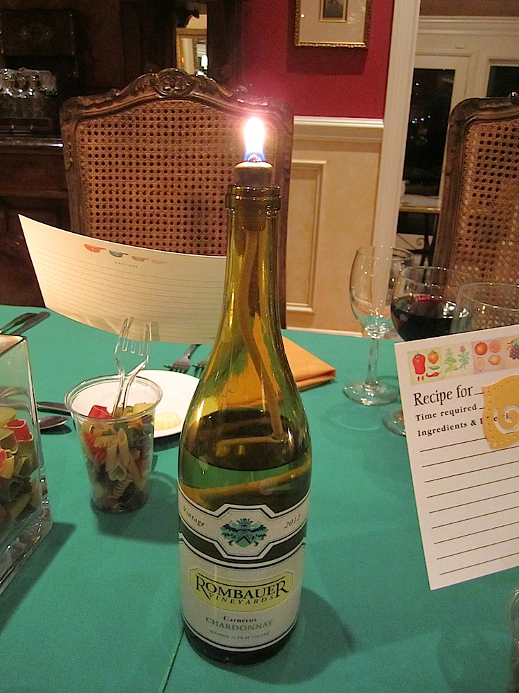 After three hours, we moved from the kitchen to the dining room. Loved the wine bottle candles.