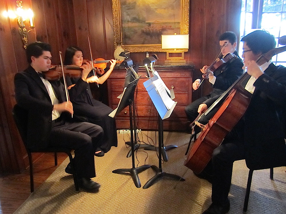 Inside, a quartet from the Knoxville Symphony Youth Orchestra performed. From left, Kai Smith, Samantha Chu, Zachary Jerome and Daniel Hong.