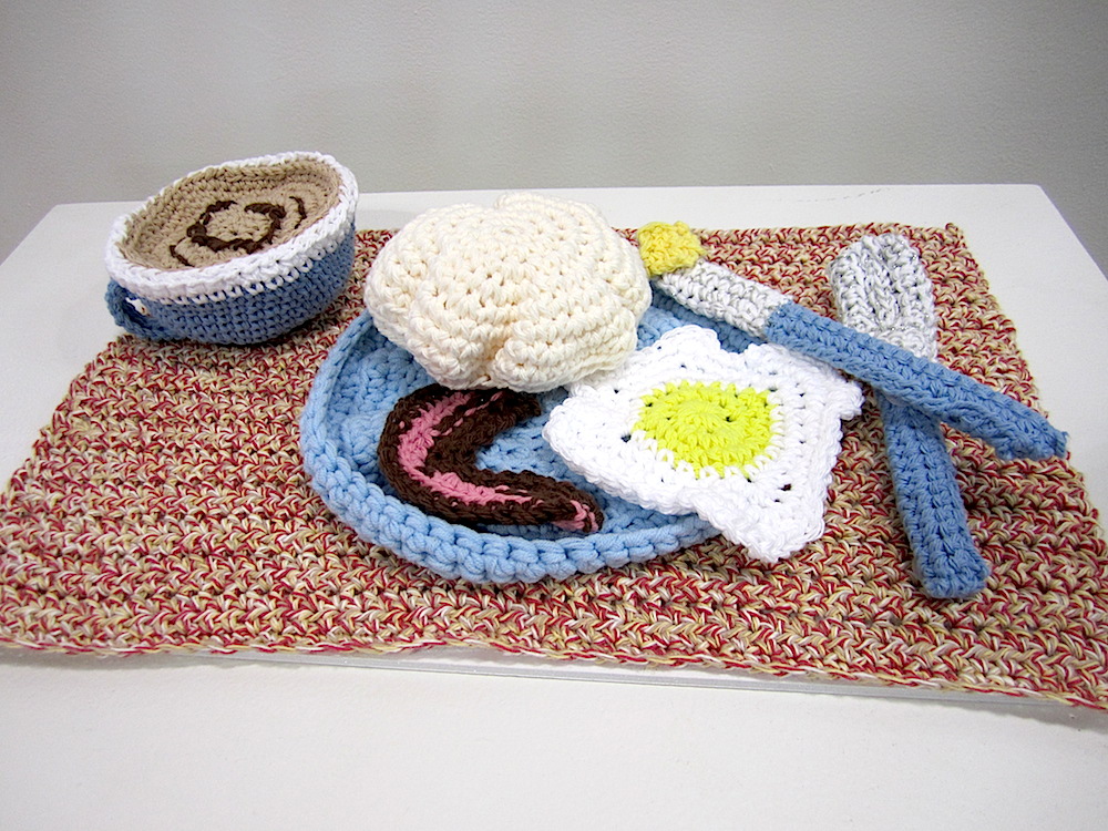 This is a crochet sculpture by Barbara Enloe of Knoxville. Called "Blue Plate Special," it won a Merit Award.