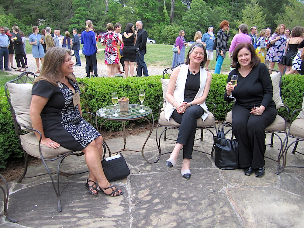 From left, Dawn Coppock, Melinda Meador and cookbook author Cynthia Graubart enjoying the pleasant evening with a glass of bubbly.