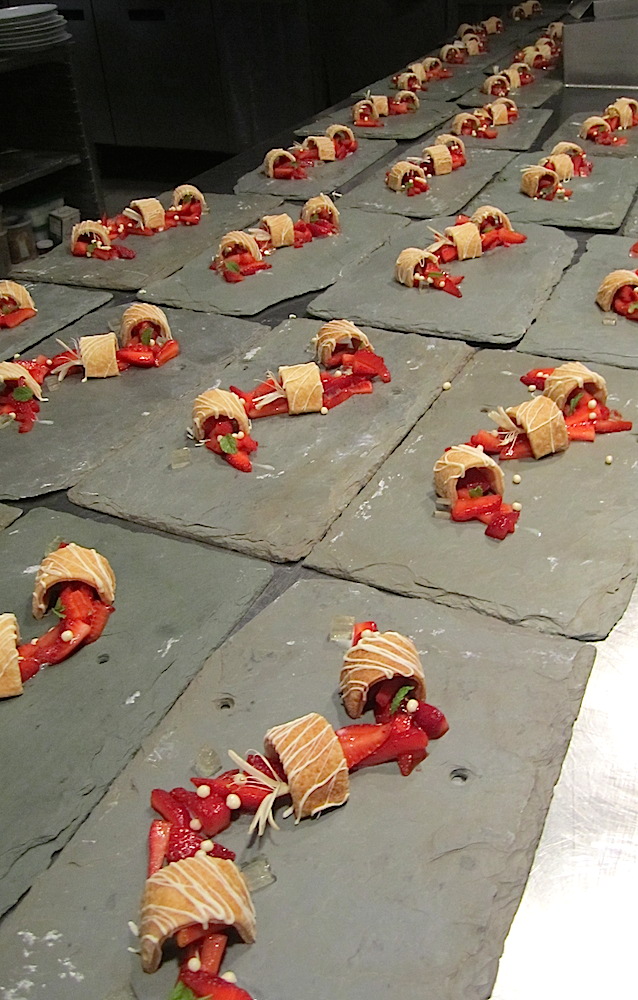 Here's dessert being plated. I barely tasted it because I was so full. But it was good.