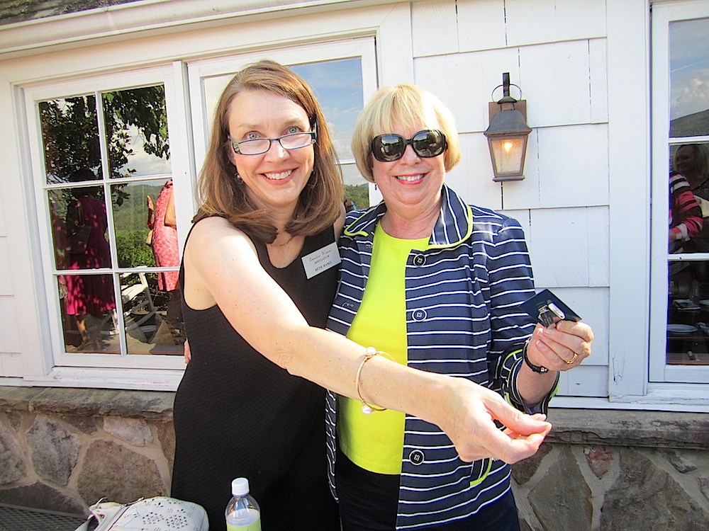 Beth Hamil, left, and Jeannie Dulaney helped distribute nametags.