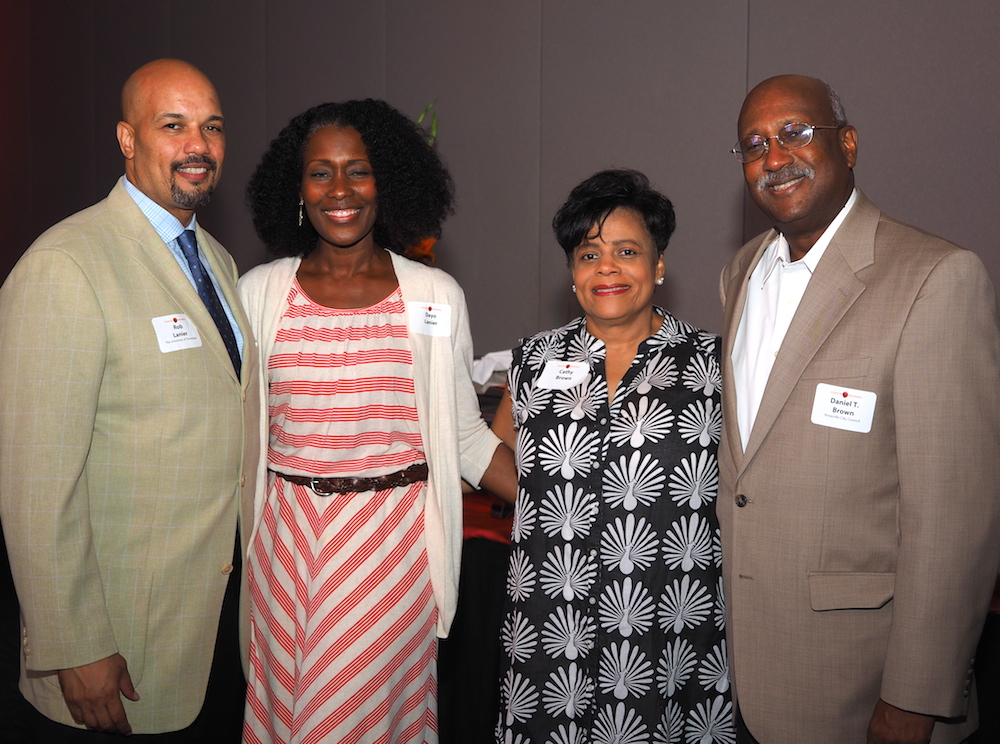 Associate Head Coach Rob Lanier, left, with his wife, Dayo, and City Councilman and former Knoxville Mayor Dan Brown and his wife, Cathy. (Photo by Gary Heatherly.)