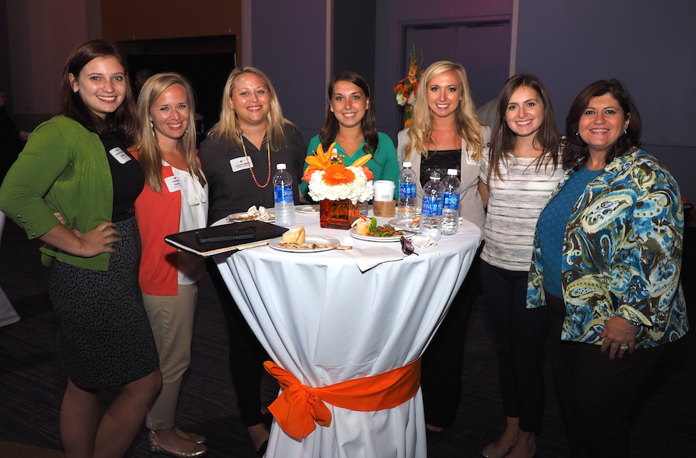 Part of the Moxley Carmichael team that staffed this event. From left, Amanda Jennings, Natalie Bailey, Lauren Miller, Cortney Roark, Xxxx xxxxx, Erin Rainey and Shaun Fulco Hyver. (Photo by Gary Heatherly.)