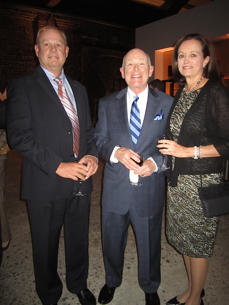 Don Hasson, left, with Jon and Mintha Roach.
