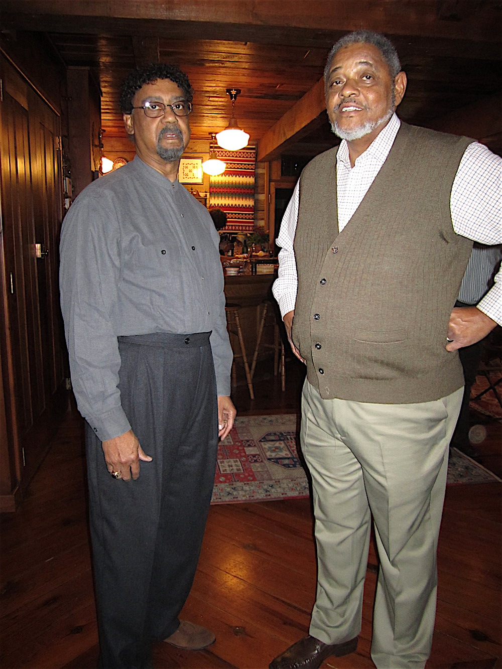 Ron Brown, left, is married to class member Gwen Brown. He's here with class member Thurman Kinnebrew.