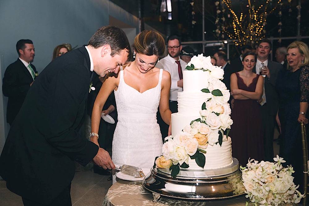 Natalie and Marshall broke away for a few moments to cut the cake. It turned out to be carrot cake! (Photo courtesy of Dani Rose Photography)