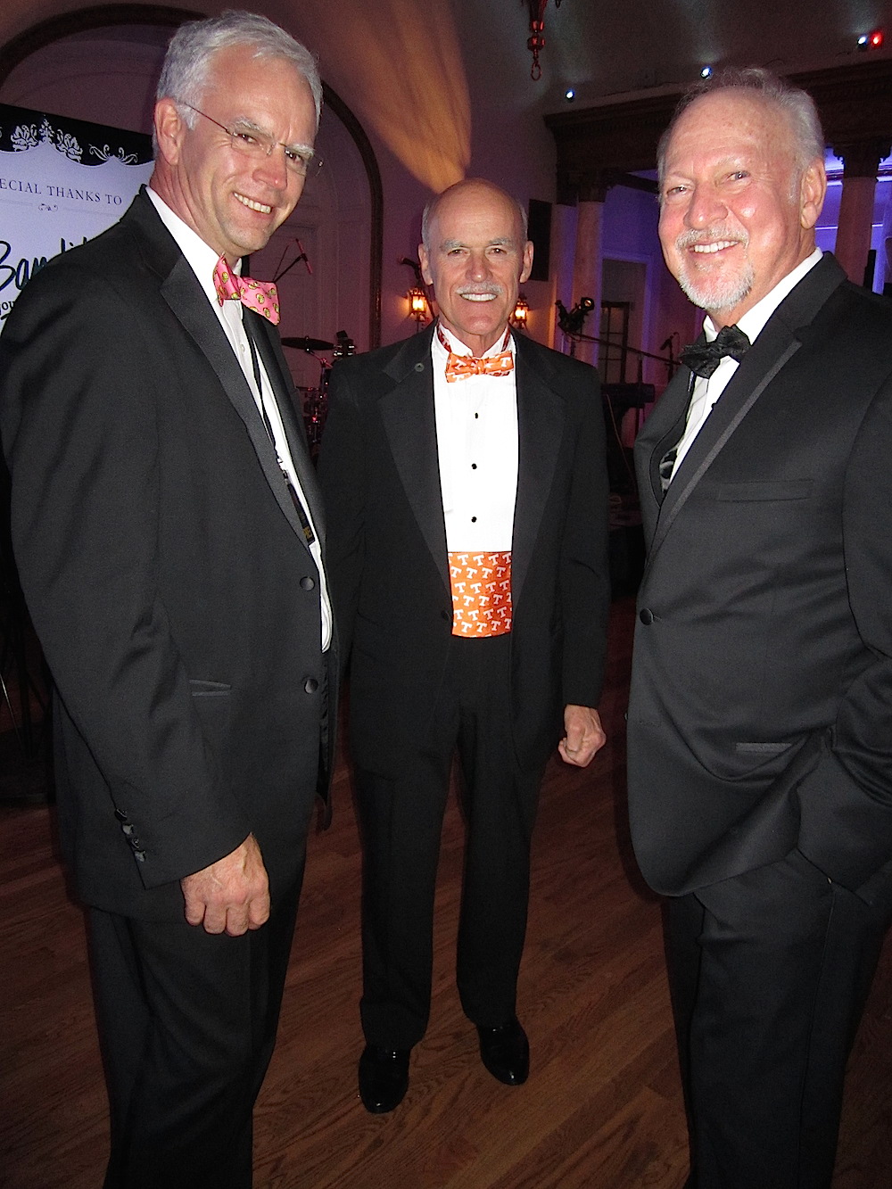 From left Nathan Sparks of City View magazine, auctioneer Bear Stephenson and Bob Spining, who chaired the Hope Gala with his wife, Jackie.