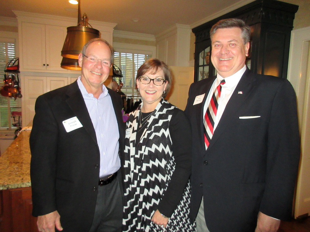 Joe Pryse, left, with Mimi and Lou Moran, Rowell's campaign treasurer.