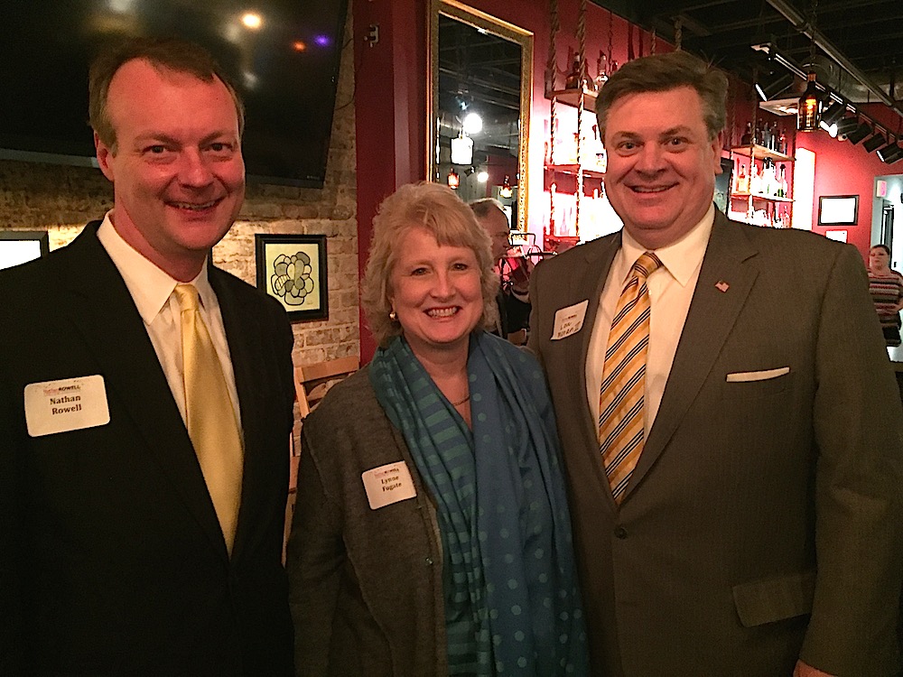 Lynne Fugate, center, with Nathan Rowell, left, and Lou Moran. (Photo by John McCulley.)