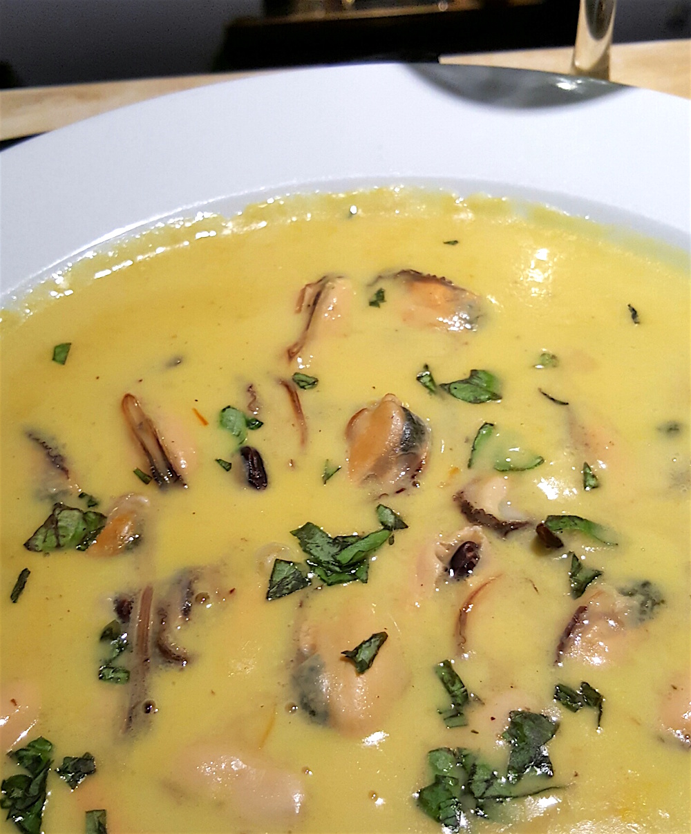 I love mussles and that's what I ordered. They normally are served in their shells dripping in champagne saffron cream sauce. But because it was my birthday, Chef Bogartz made the dish into a stew. It was fantastic.