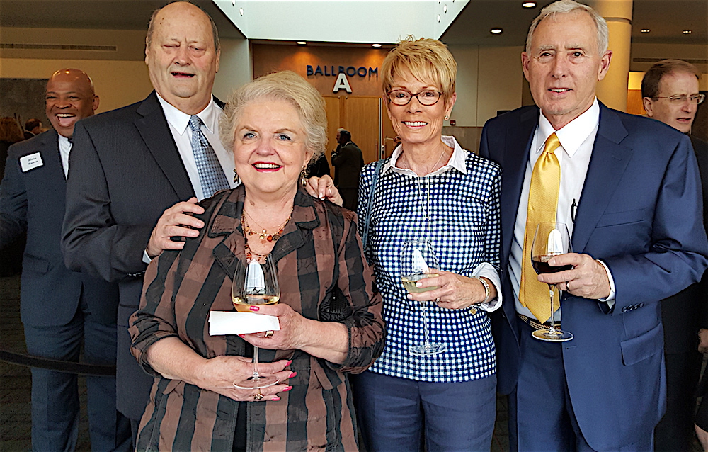 Richard and Dawn Ford, left, with Jackie and Ray Fisher. (With a photobomber, Alvin Nance!)