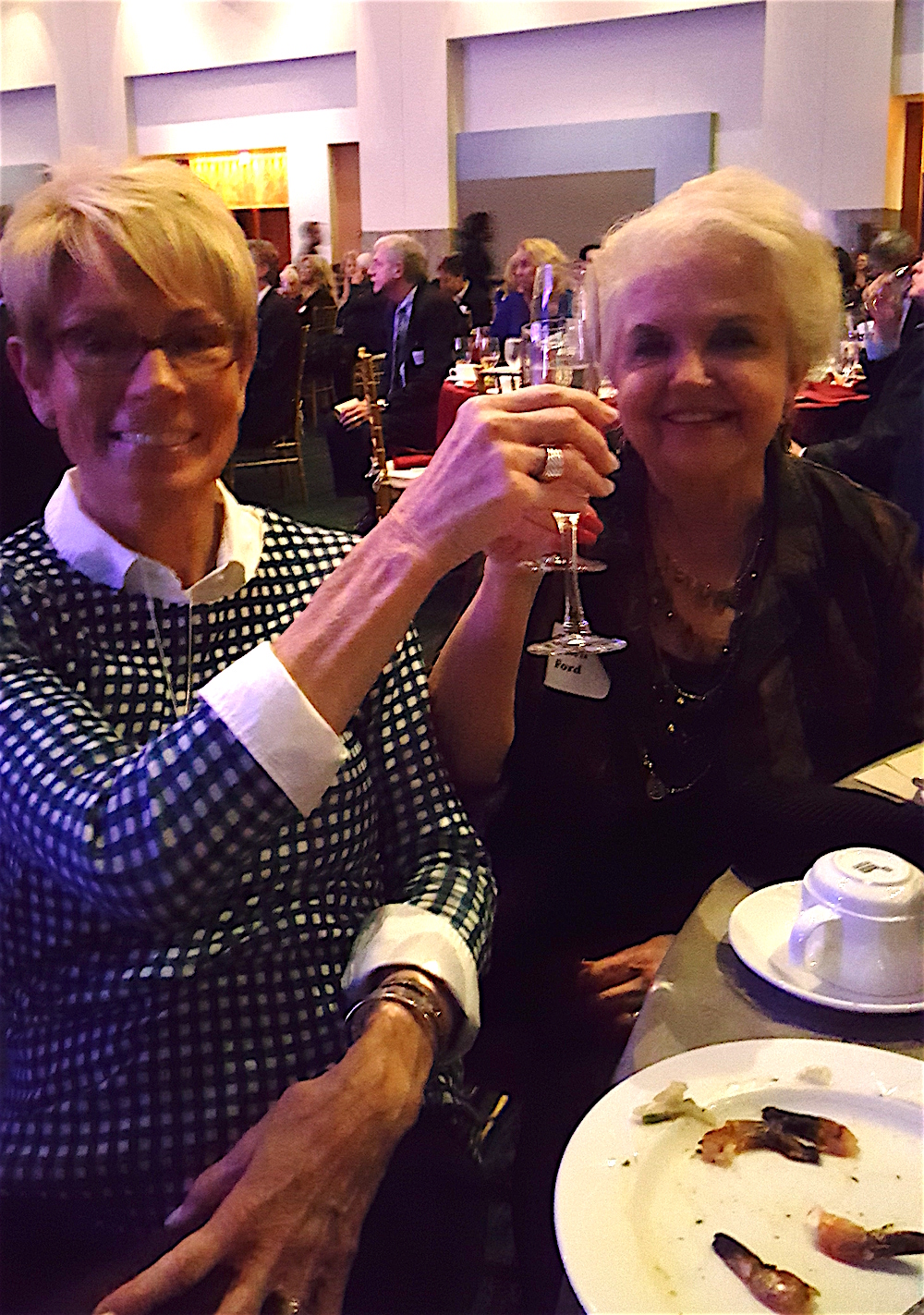 Cheers! Jackie Fisher, left, with Dawn Ford.