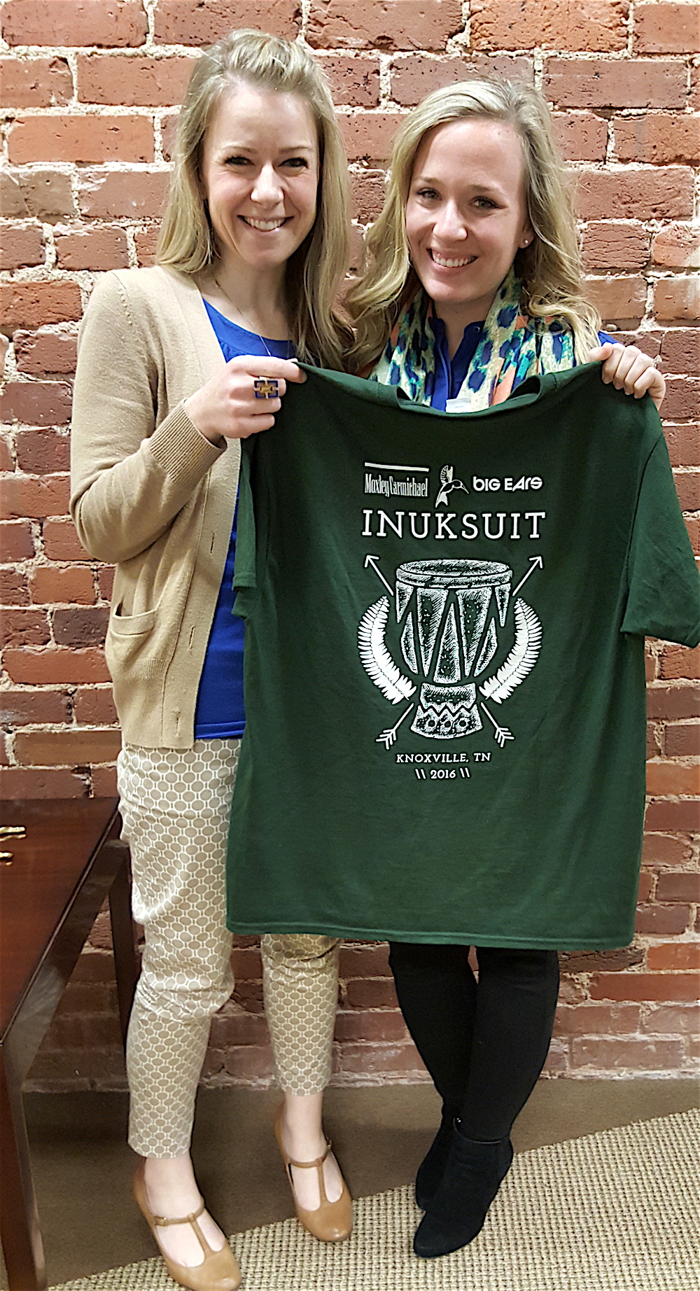 In all thee pics, you can only see the front of the shirts we made. Here's the back. Erica Beck, left, designed them. Natalie Bailey, right, was part of our event team for Inuksuit. We ended up giving the musicians all our leftover shirts.