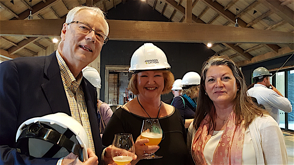 From left, Alan Carmichael, Sheena McCall and Melinda Meador at the cocktail party.