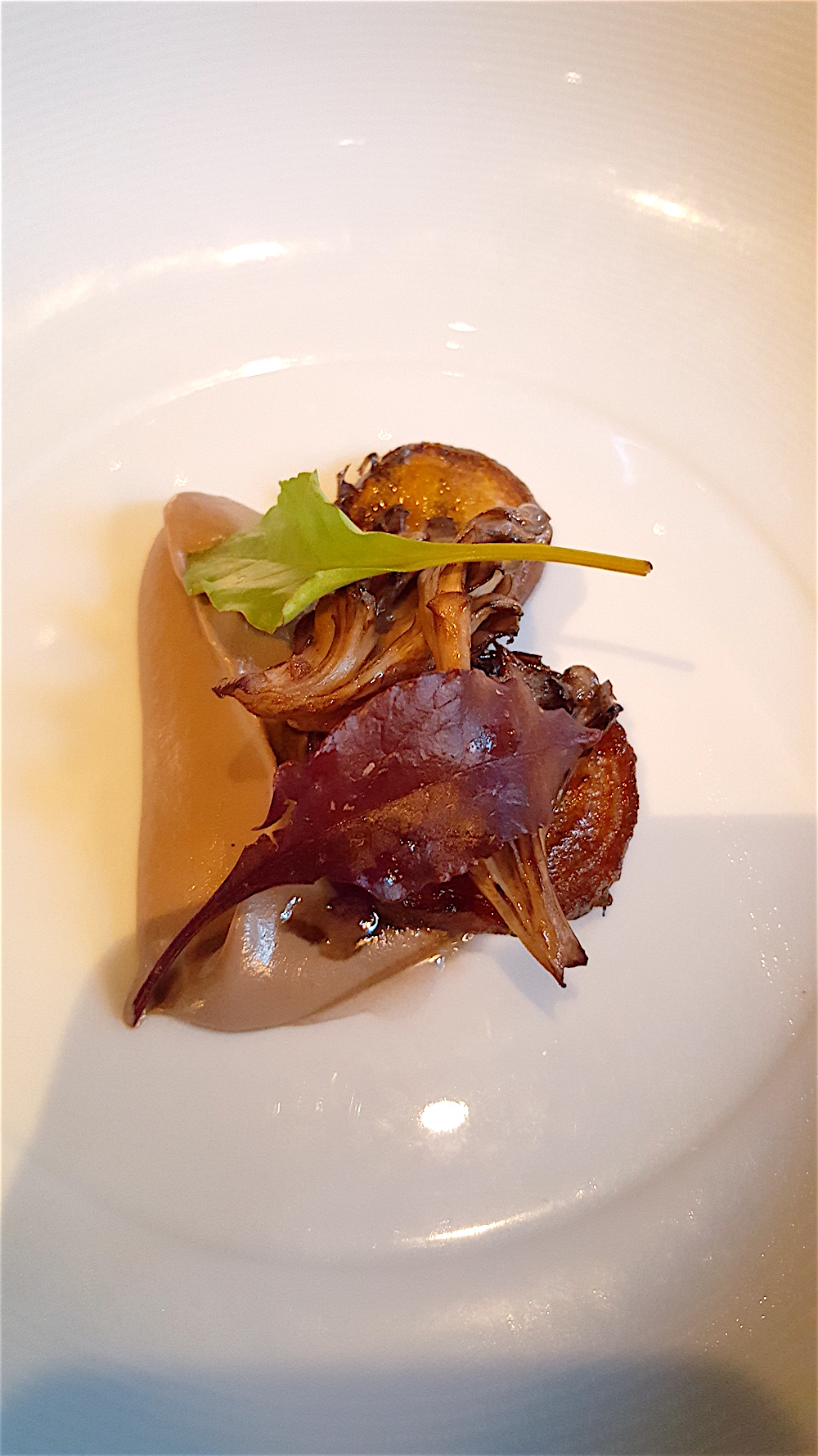 This was my favorite course: roasted golden beets with hen of the woods mushrooms, beet greens and pine syrup. I don't normally enjoy chardonnay, but it was the perfect match for this.