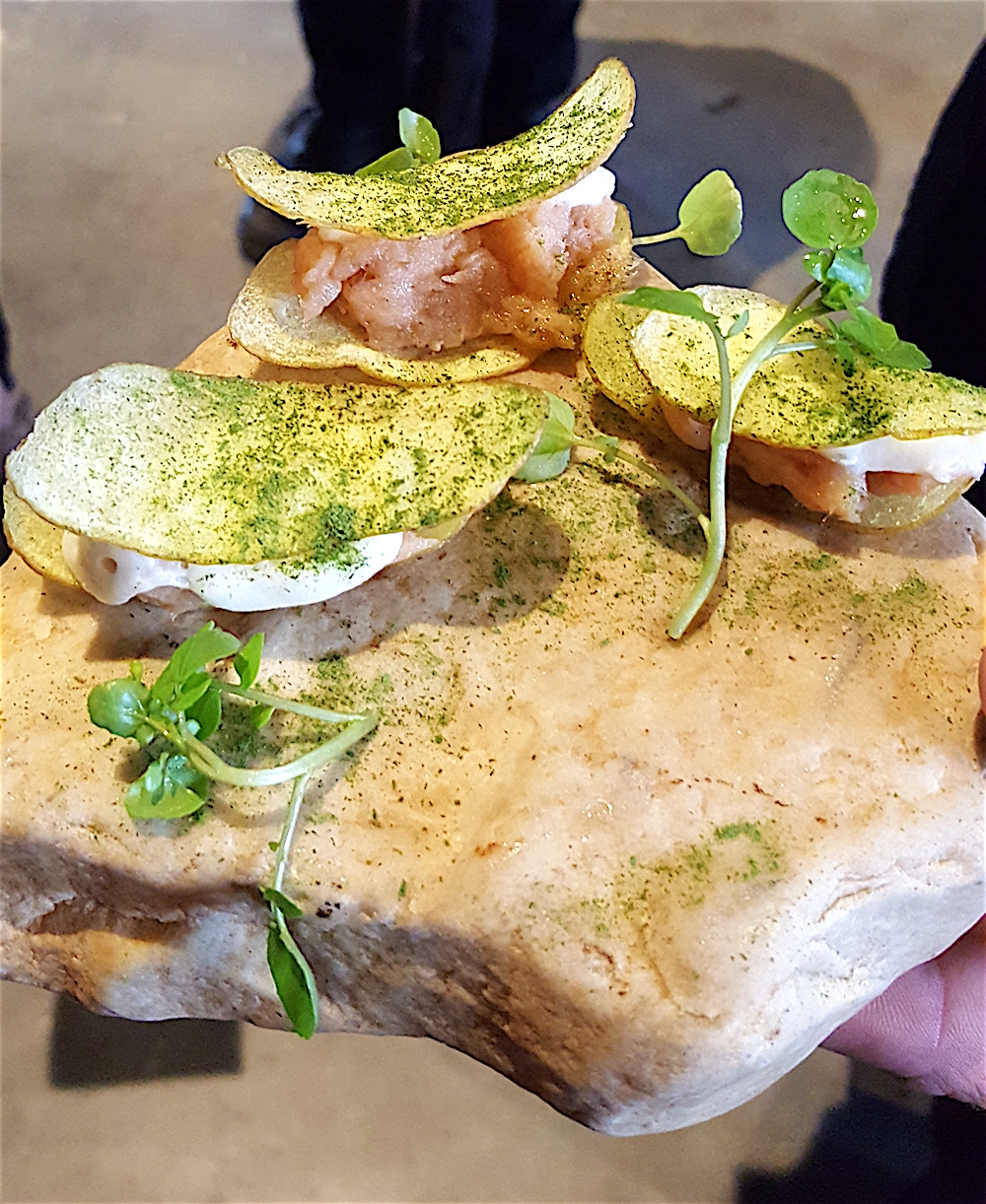 The smoked trout with homemade potato chips and creme fraiche were served on rocks!