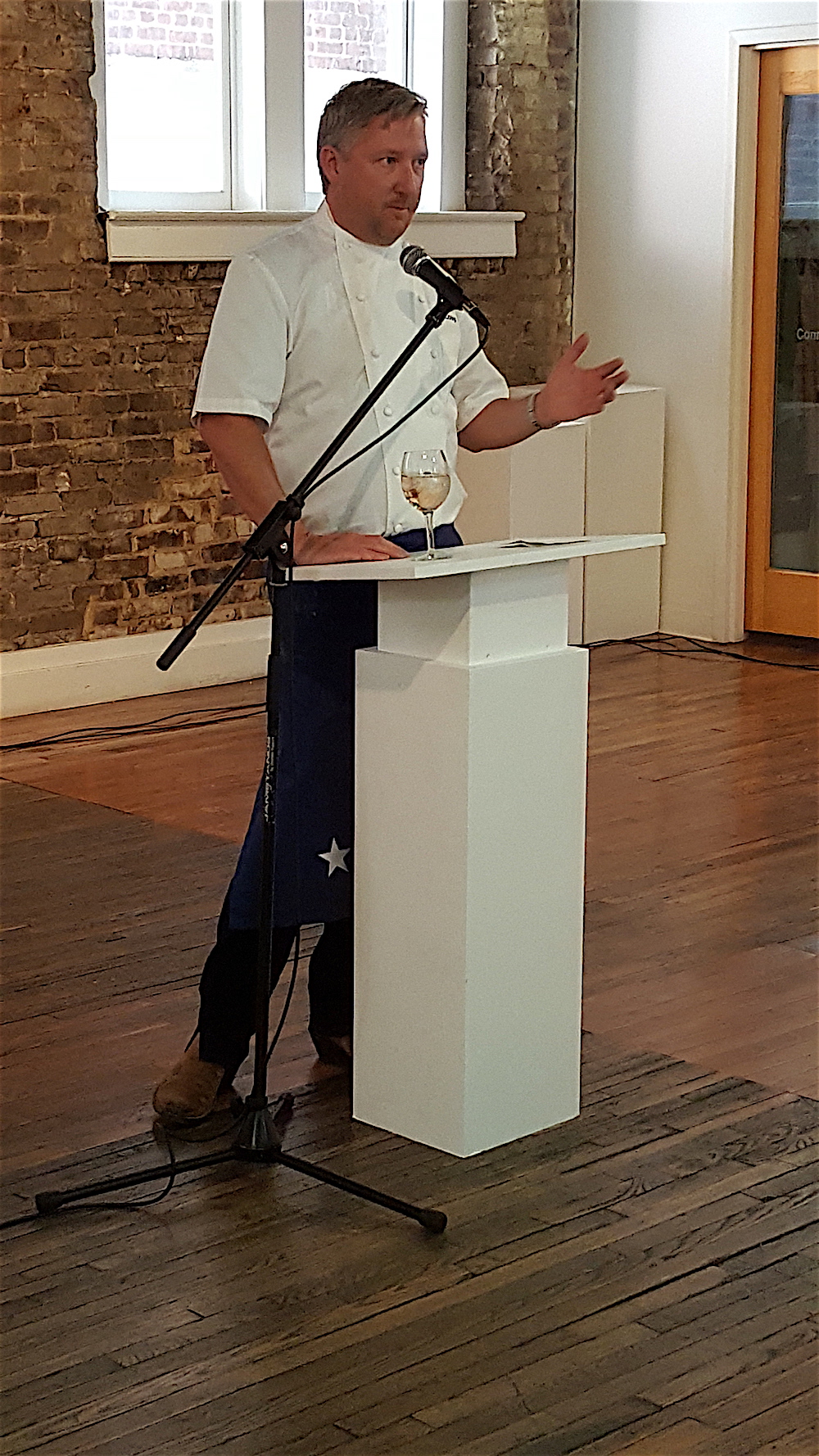 Chef Tim Love making remarks. Everyone is looking forward to The Lonesome Dove opening.