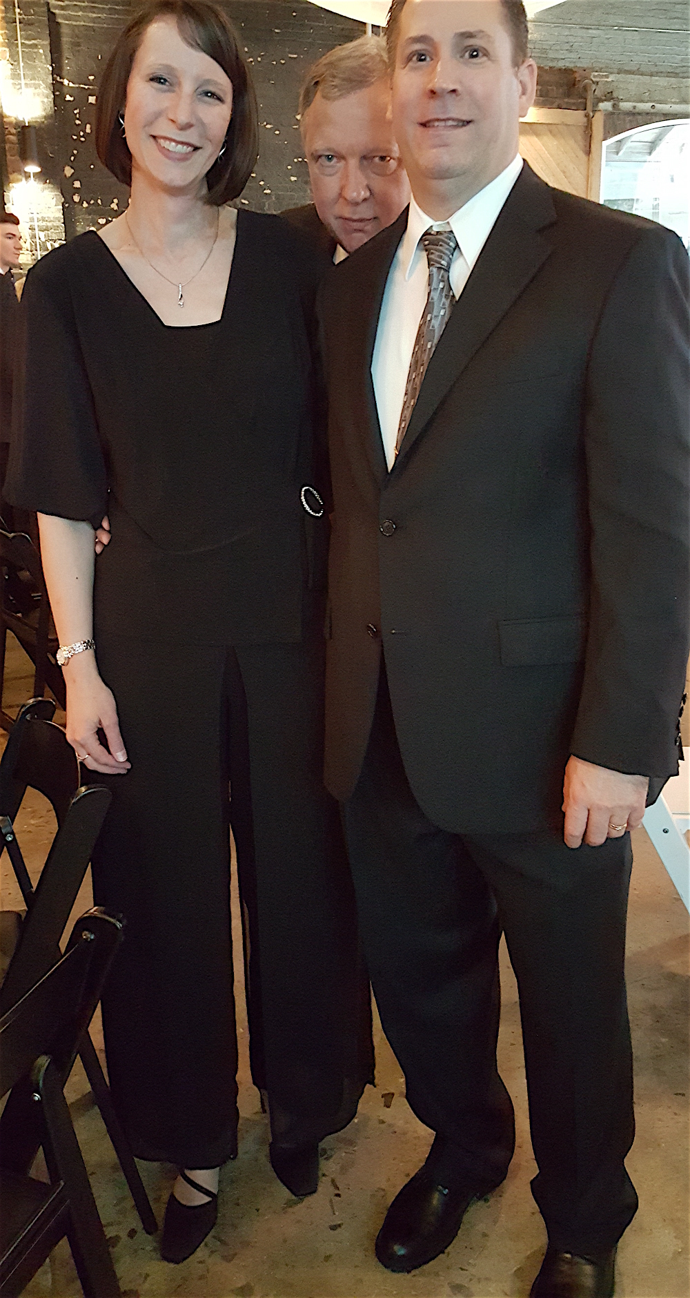 Knoxville Symphony Executive Director Rachel Ford and her husband, Terry, with photobomber Cal MacLean, the artistic director of the Clarence Brown Theatre. Ha.