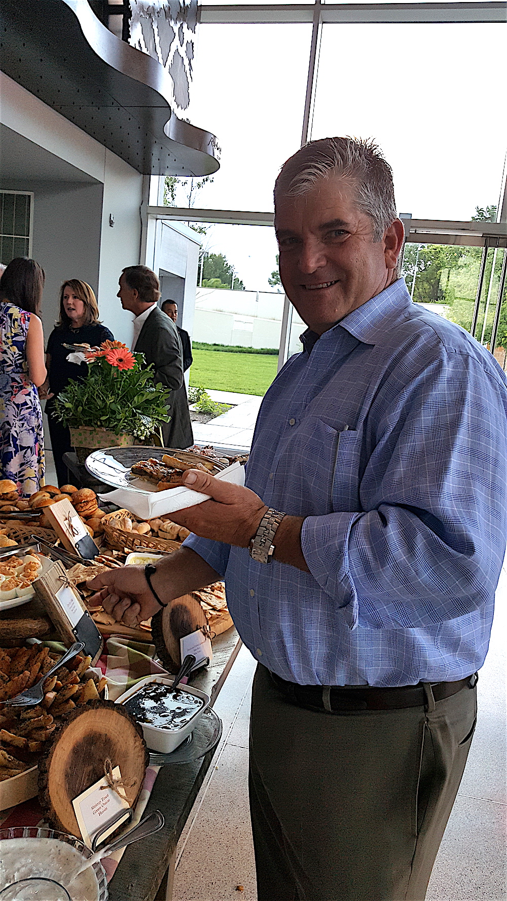 Francis Norris sampling some of Holly's wares.