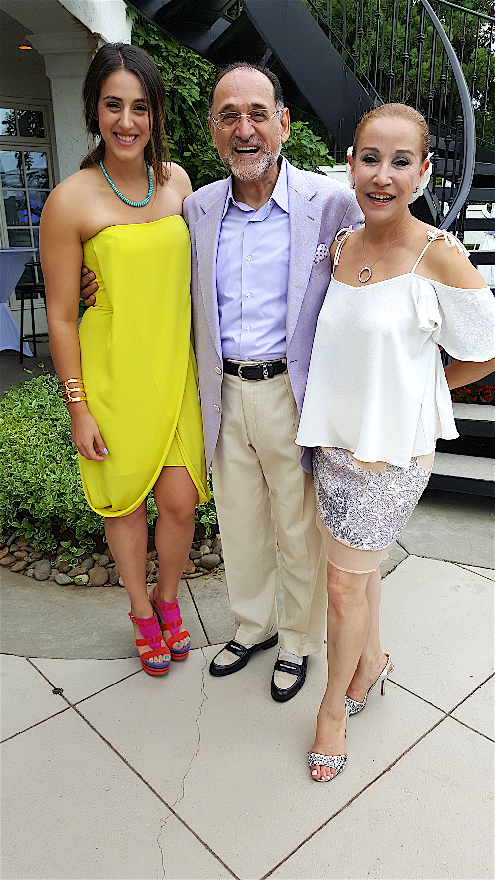 The hosts, Hash and Nazzy Hashemian and their daughter, Nikki, at left.