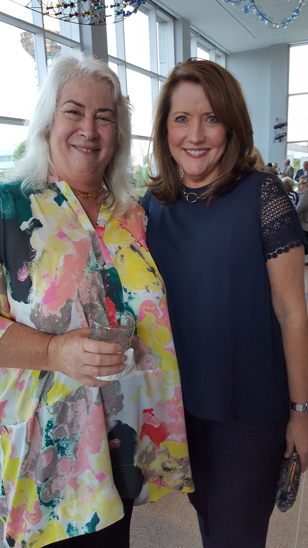 Artist Tommie Rush, left, with First Lady Crissy Haslam.