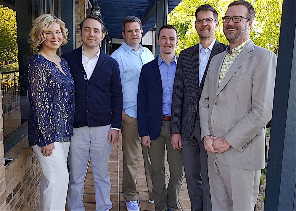 Attorney John Winemiller, right, is a member of the Symphony Board. His guests, from left, were Kara and Ian McFarland, Robbie Arrington and Travis Vickery.