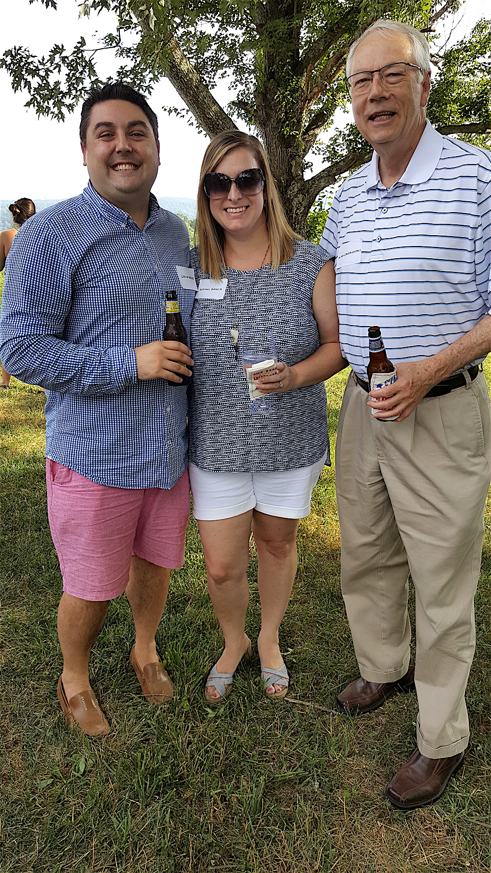 Gavin and Naomi Baker with Alan Carmichael, right.