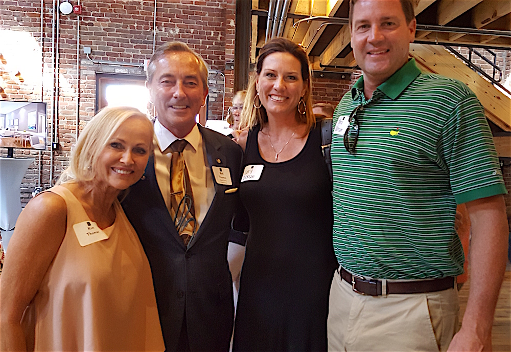 From left, Kim and County Commissioner Bob Thomas with Cory and Trey Dickson.
