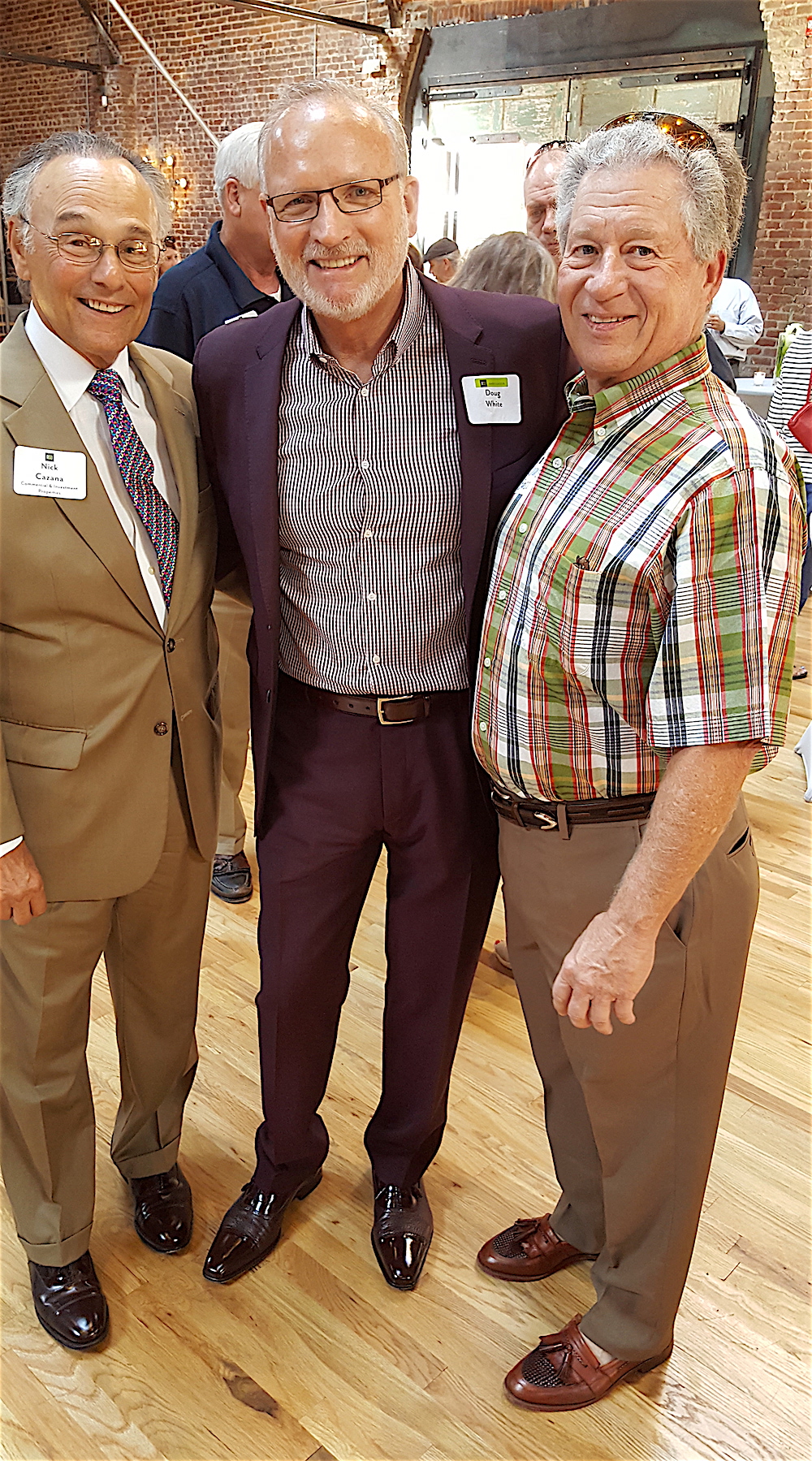 From left, developer Nick Cazana, Doug White and Richard Bass. Cazana is developing The Tennessean, a boutique hotel and 12 luxury condos on the west side of downtown.