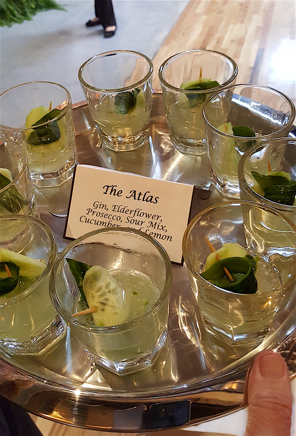 Here's one of the signature cocktails: The Atlas. It contains gin, elderflower, Prosecco, sour mix, cucumber and lemon.