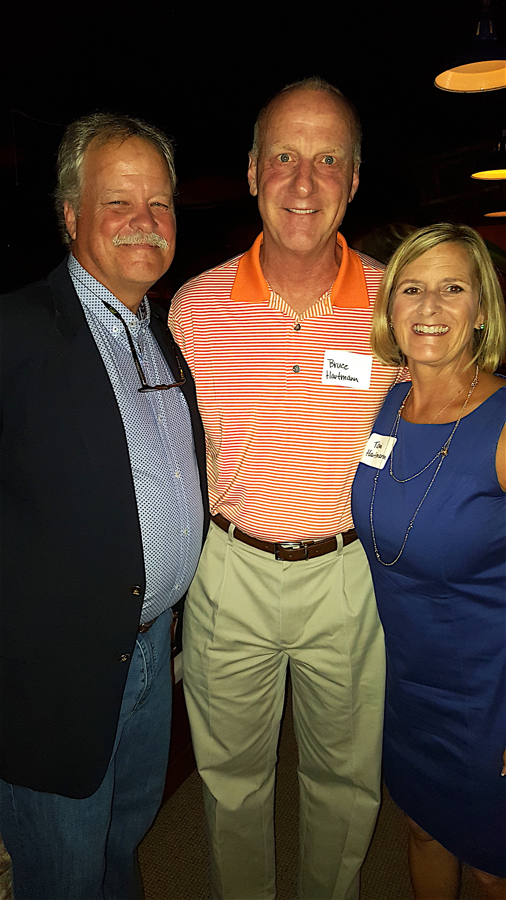 Adrian with Bruce and Tami Hartmann.
