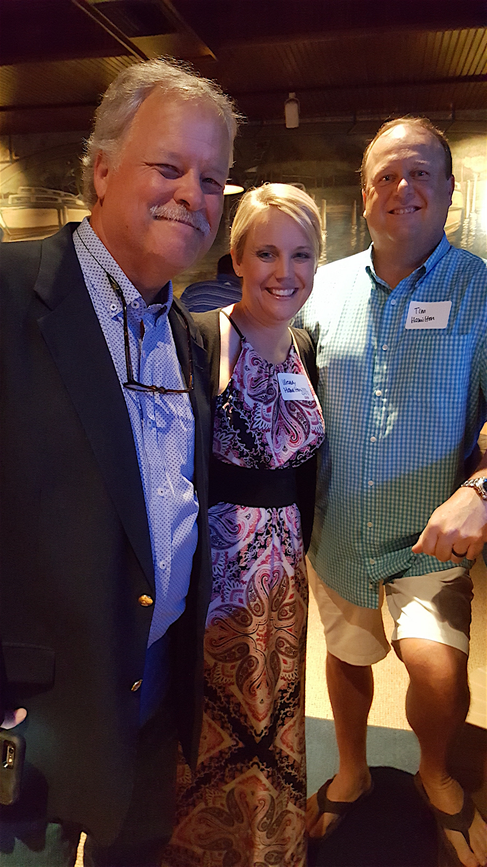 Adrian Pearce, left, with Pilot Flying J's Wendy Hamilton and her husband, Tim.