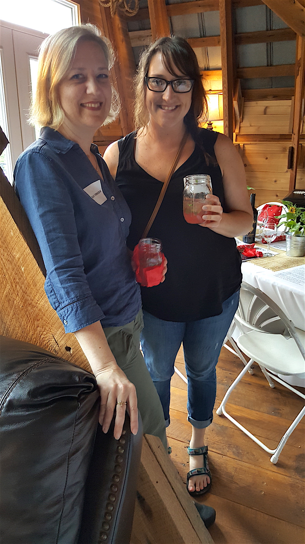 Becky Hancock, left, and Lila Honaker, both of the Tennessee Theatre, checking out the living room before dinner.