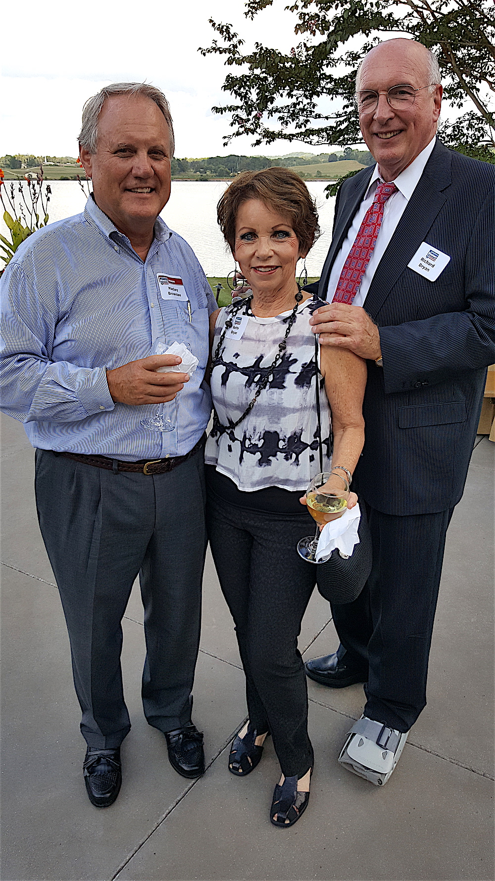 Mackay Brownlee, left, with Bette and Richard Bryan.
