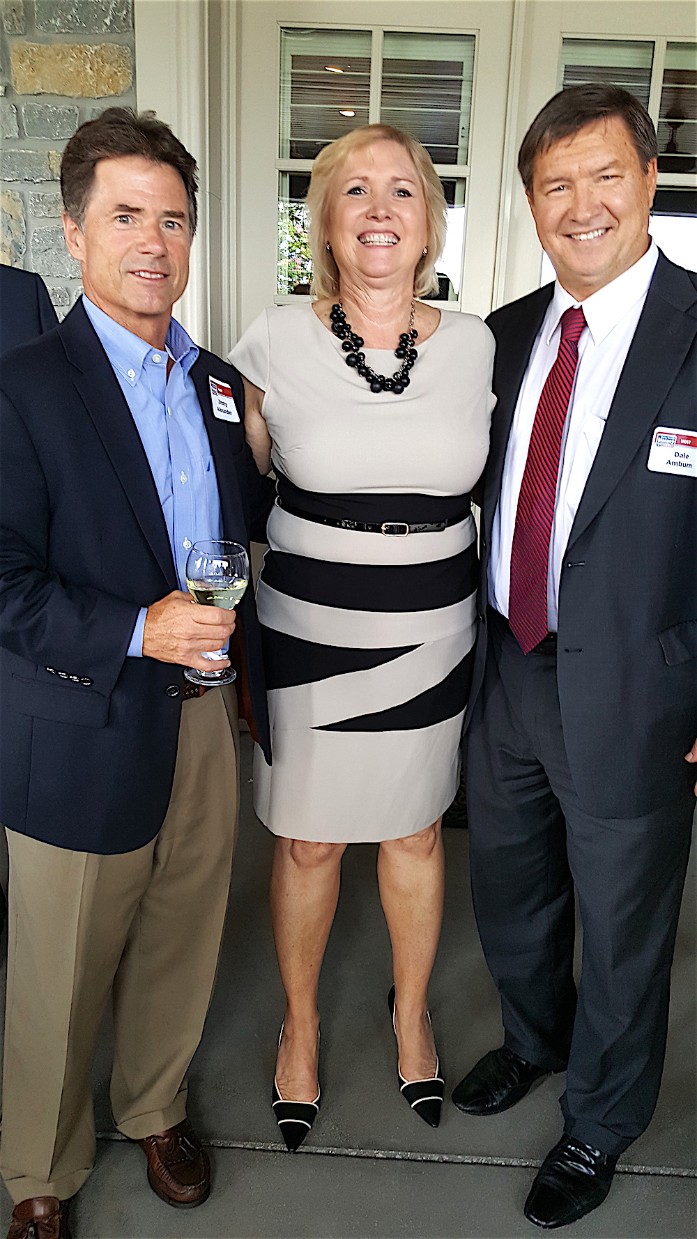 Becky Massey with Jimmy Alexander, left, and Dale Amburn.