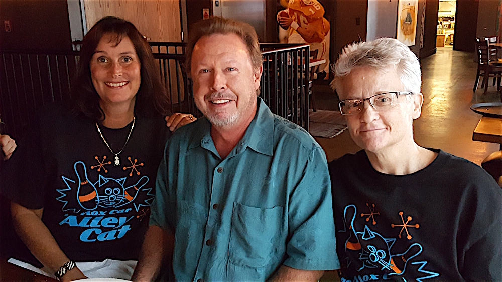 Michelle and David Henry with Maria, right.
