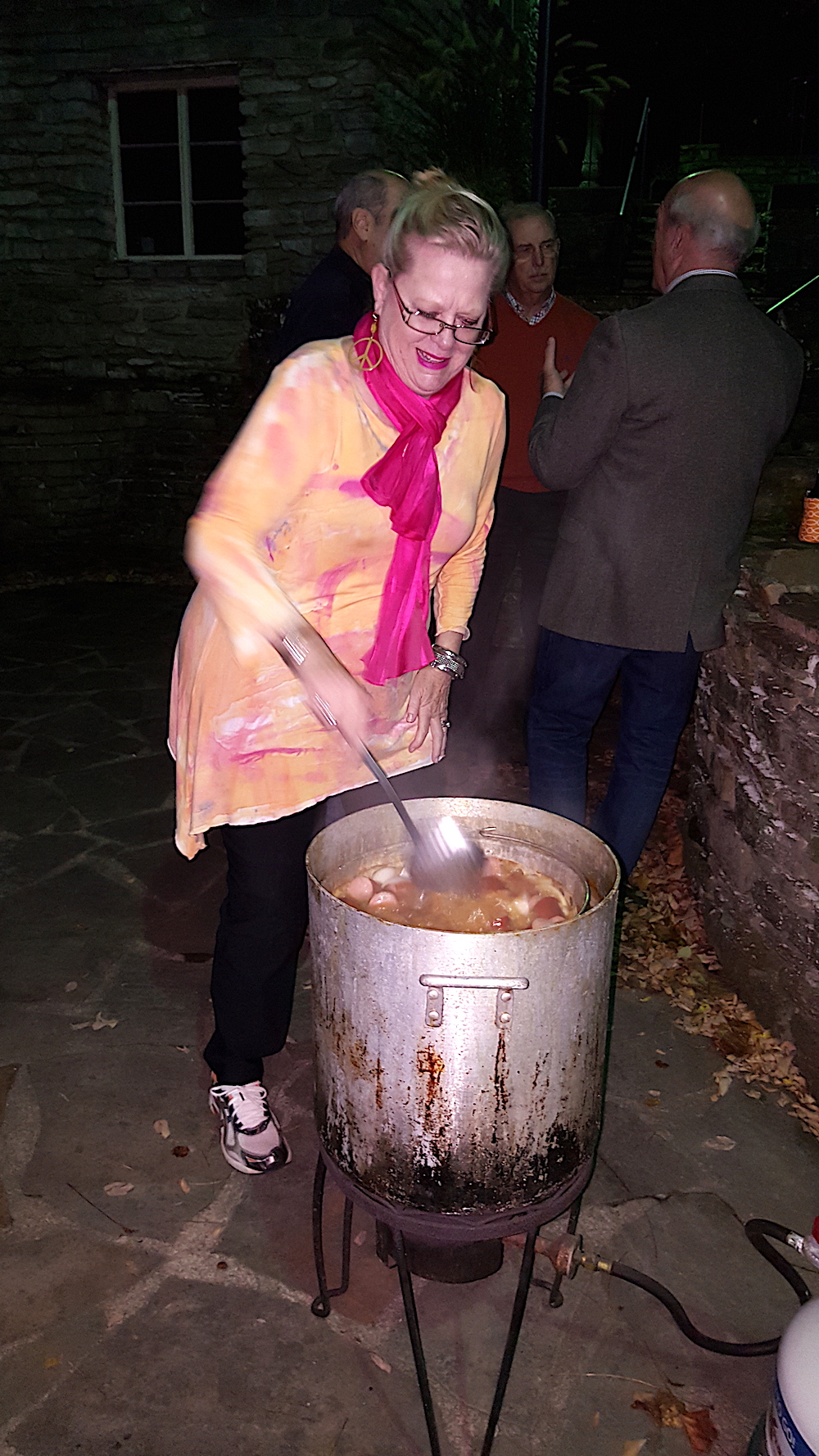Allyn stirring the victuals.