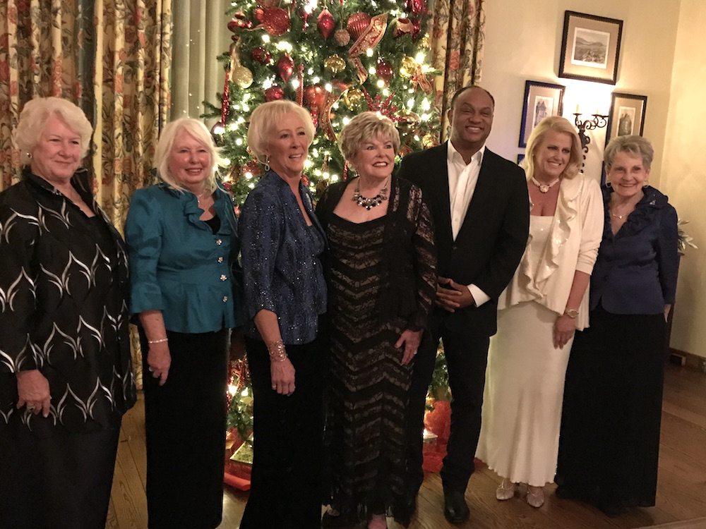 Members of the Ball Committee posing with the evening's emcee, Hallerin Hilton Hill. From left: Julia Shiflett, Harriet Hodge, Rhonda Webster, Charleene Edwards, Hill, Susan White and Jane Venable.