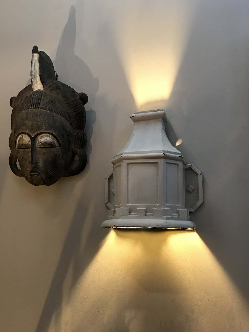 Jeff took this downspout from a historic building, turned it upside down and made a light fixture of it!