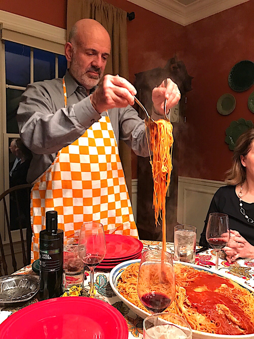 University of Tennessee President Joe DiPietro serving guests the best spaghetti this side of Italy.