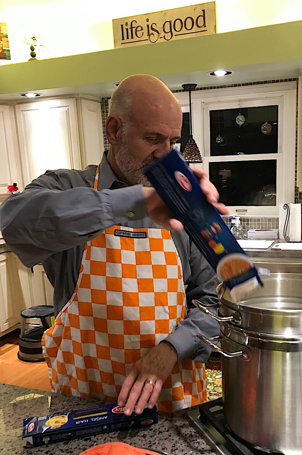 Dr. Joe stepped into the kitchen to put pasta into boiling water. He used angel hair pasta. The cooking took just three to four minutes.