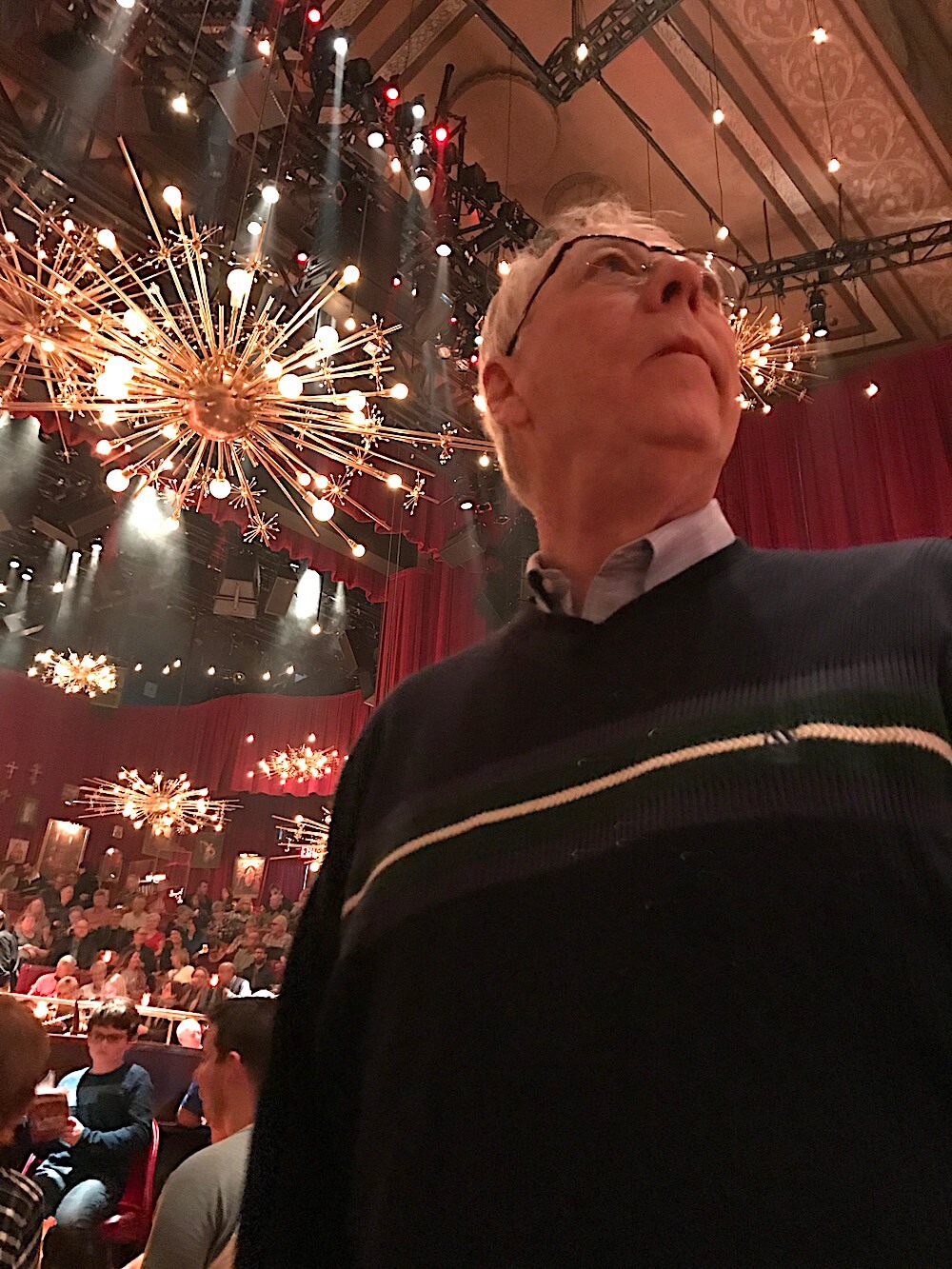 Alan surveys the scene before the start of "The Great Comet."