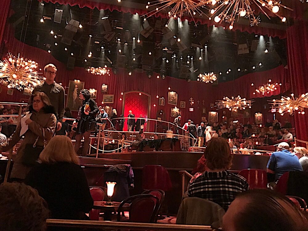 The set was fantastic, with all kinds of seating at tables and banquettes available. We were on an aisle beside an elevated runway. An usher warned Alan before the show started not to put his elbow out too far for fear of tripping the actors.