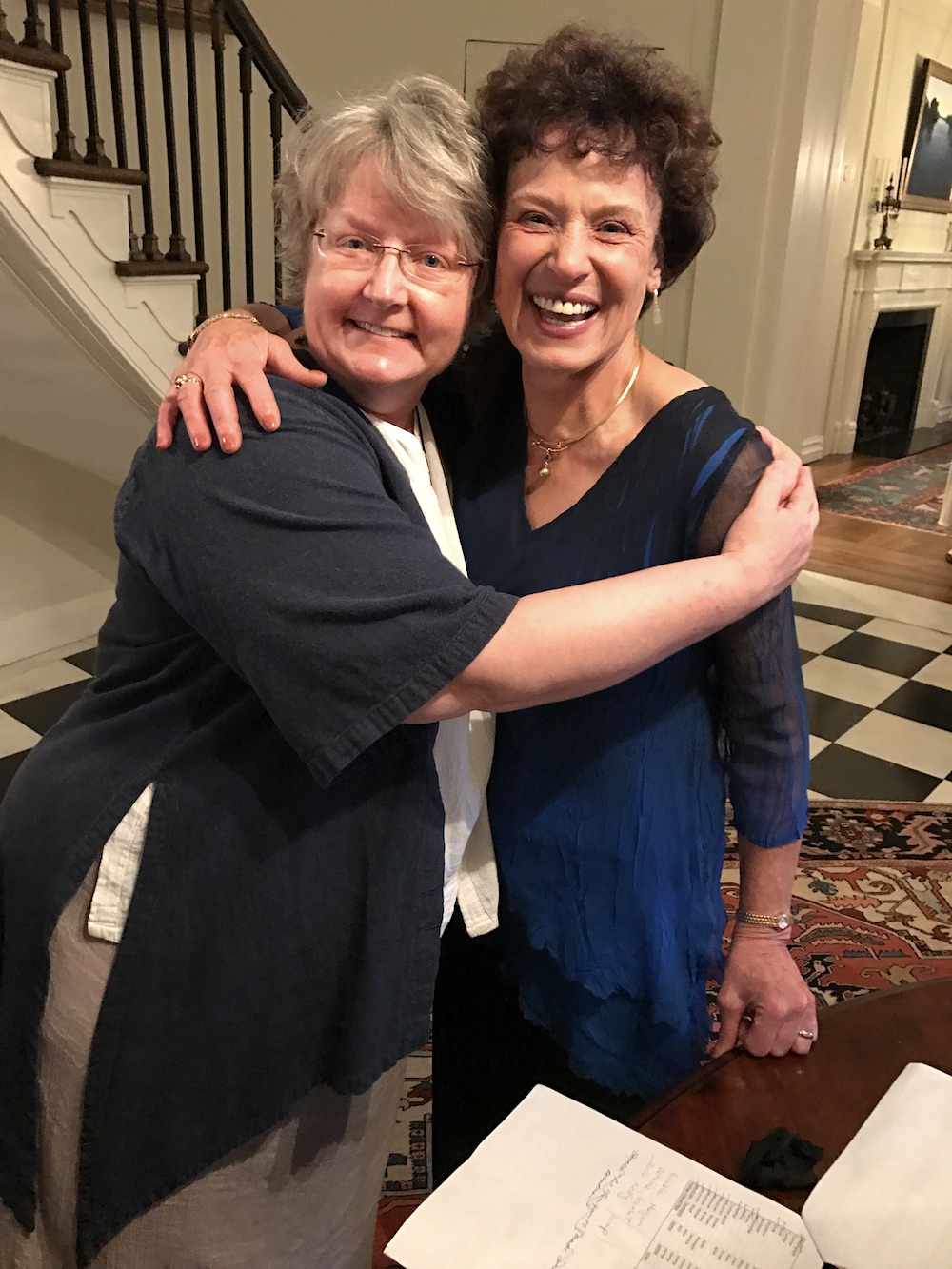 Cindy Hassil greets her friend Barbara Crist. Cindy is on the Jazz Orchestra Board and Barbara was a key leader in making this event happen.